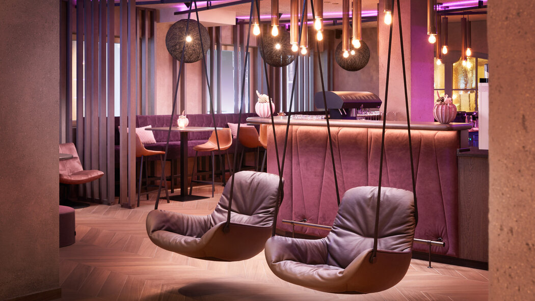 adler inn tyrol mountain resort lobby sessel schaukel hintertux